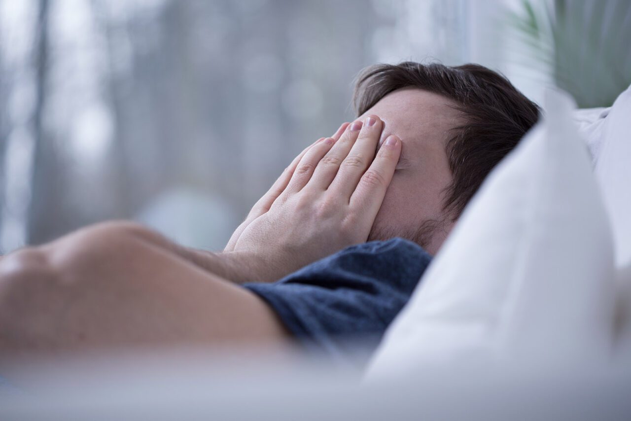 Man that cannot fall asleep Man with insomnia - Ideal Image Dentistry
