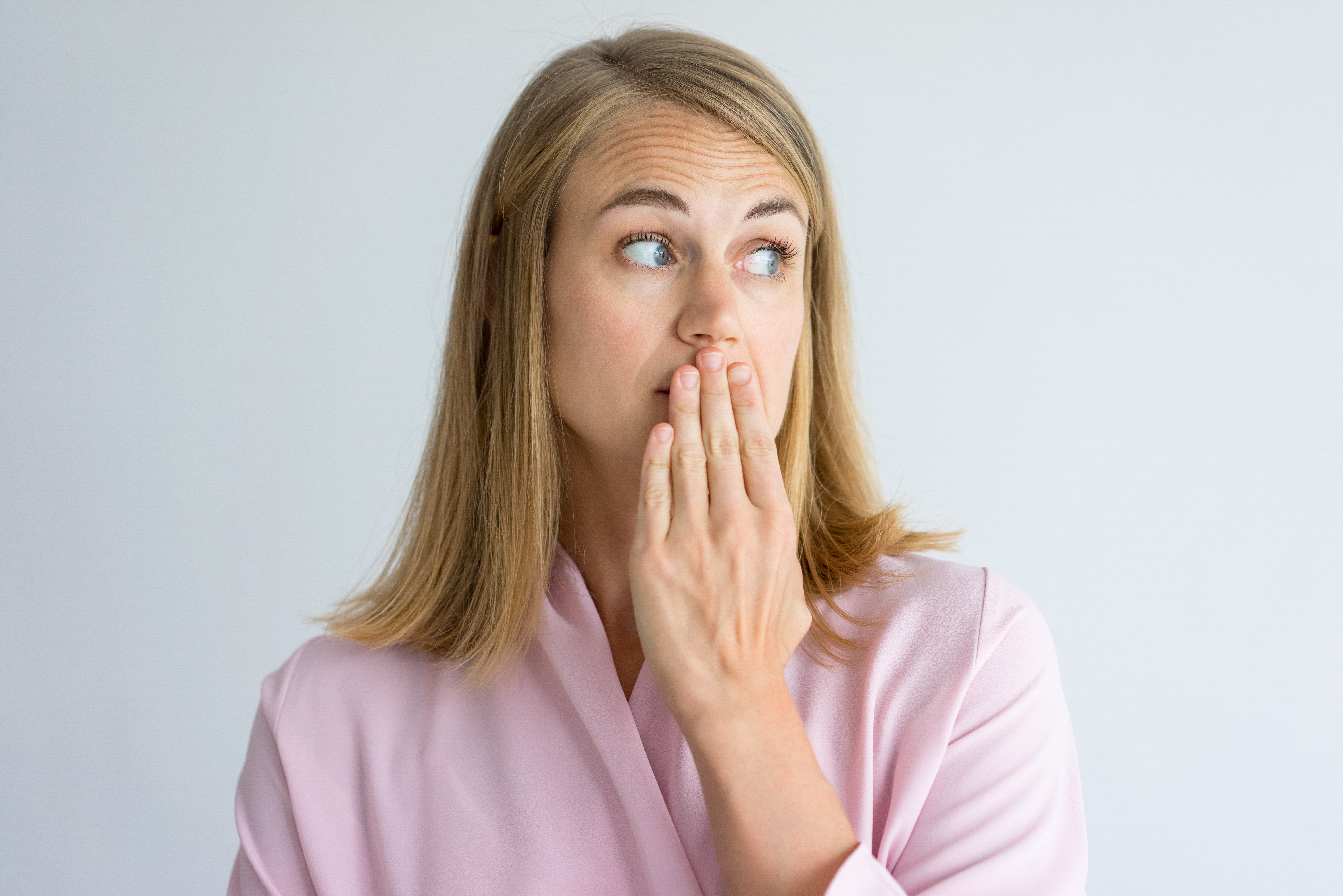 Woman worried she has bad breath - Ideal Image Dentistry